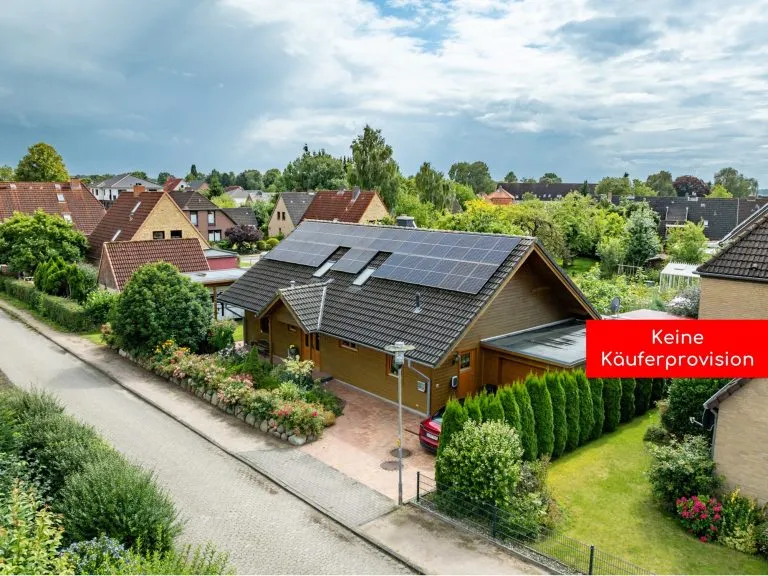 Moellerherm Immobilien - Immobilienangebot - Reinfeld - Alle - Gartenparadies mitten in Reinfeld - Familienfreundliches Einfamilienhaus mit Kamin, Garage, PV-Anlage und Wallbox