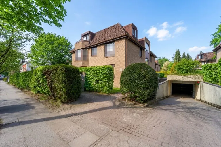 Moellerherm Immobilien - Immobilienangebot - Ahrensburg - Alle - Gemütliche 2-Zimmer-Wohnung mit Loggia, TG-Stellplatz und grünem Ausblick