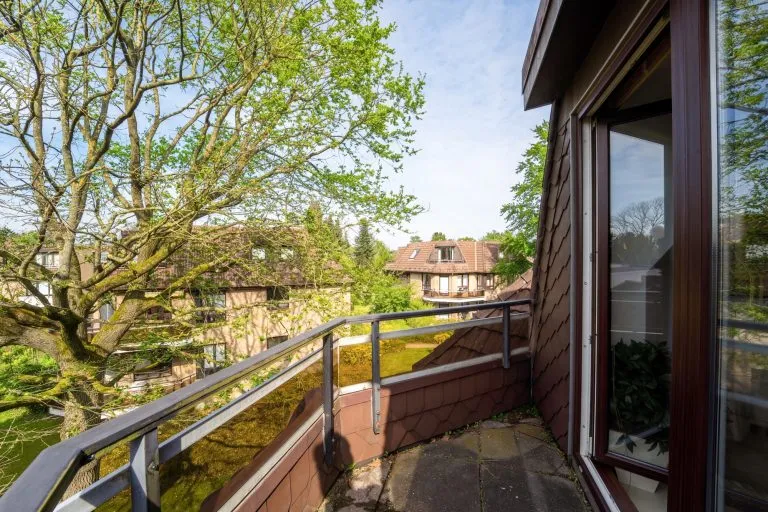Moellerherm Immobilien - Immobilienangebot - Ahrensburg - Alle - Gemütliche 2-Zimmer-Wohnung- Solide Kapitalanlage mit Loggia, TG-Stellplatz und grünem Ausblick