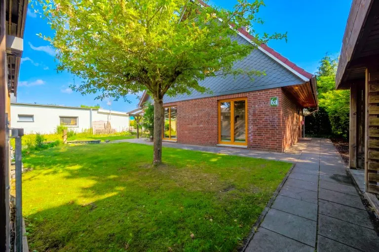 Moellerherm Immobilien - Immobilienangebot - Ratekau - Alle - Verstecktes Idyll in Sereetz - Einfamilienhaus in hochwertiger Holzständerbauweise mit Verblendung in ruhiger zweiter Reihe